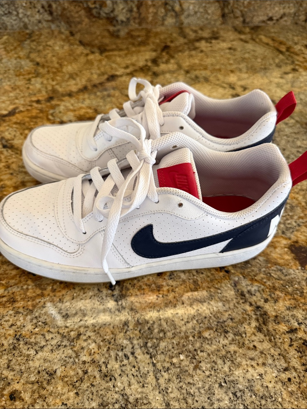 Nike Kids White Low-Top Sneakers with Navy Swoosh and Red Pull Tab